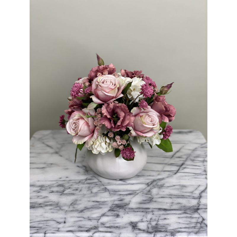 Kunstblumen Arrangement in einer Vase