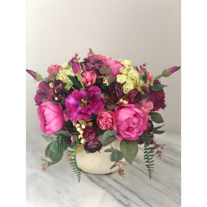 Kunstblumen Arrangement in einer Vase