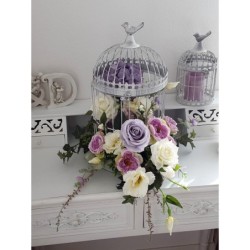 Kunstblumen im Käfig