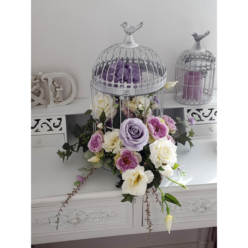 Kunstblumen im Käfig