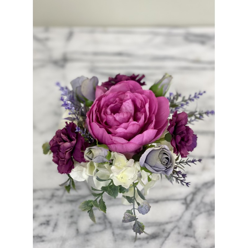 Kleines Kunstblumenarrangement in einer Vase befestigt 3